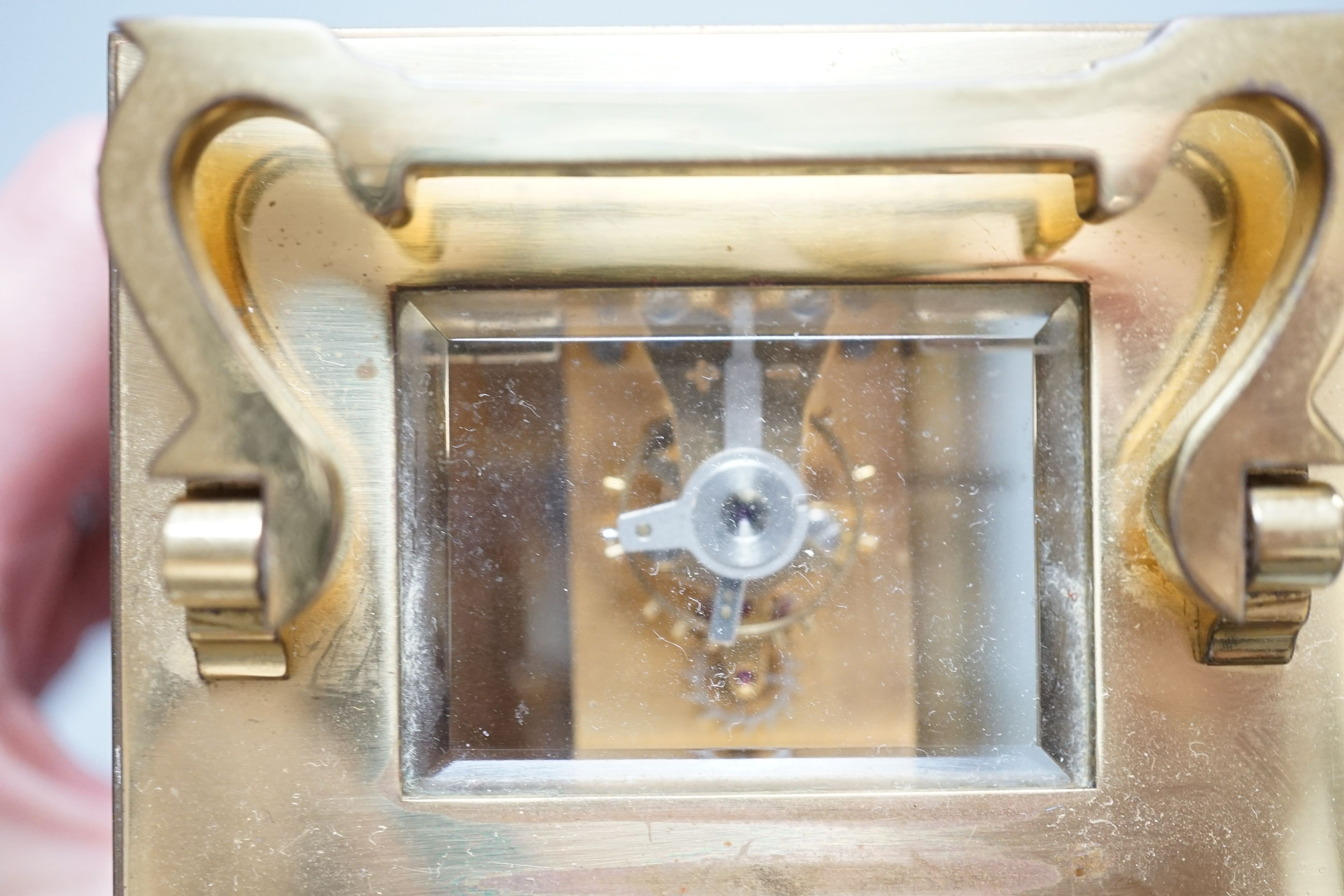 Two modern brass carriage timepieces, one oval cased